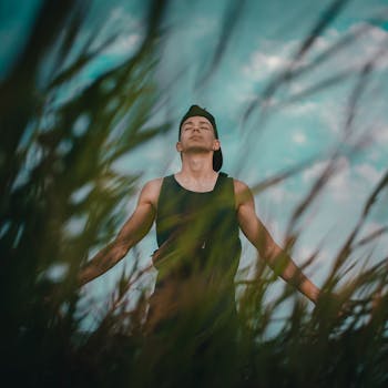 Man Standing on Grass